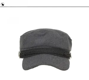 Front view of dark grey wool newsboy cap with black braided rope and metal side buttons