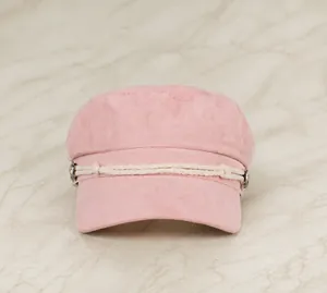 Front view of pink military beret hat with white woven rope and metal buttons