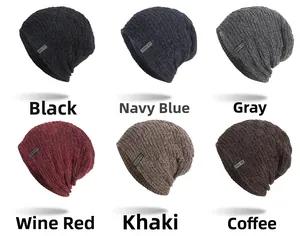 Flat lay display of knit beanies in six colors with ribbed texture and woven labels