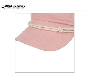 Detail view of pink suede cadet hat with decorative off-white braided rope detail