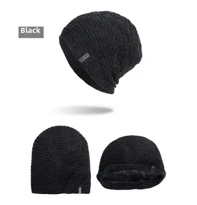 Detailed view of black knitted beanie with warm fleece lining and textured horizontal pattern