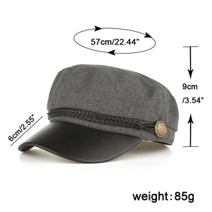 Gray wool baker boy hat with black leather brim and vintage gold button detailing