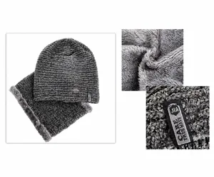 Close-up of dark grey knitted winter hat and neck warmer set with warm plush fleece lining
