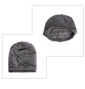 Macro shot of dark grey knit hat showing thick faux fur lining and 'POWER' woven label