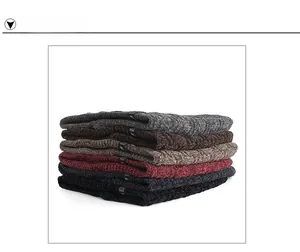 Vertical stack of knit neck warmers in six colors including grey, brown and burgundy