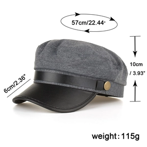 Grey knit baker boy hat with black faux leather brim and gold button detail