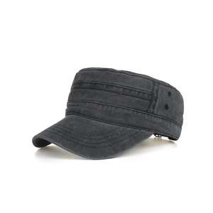 Detail view of black washed cotton military cadet cap with metal eyelets and stitch lines