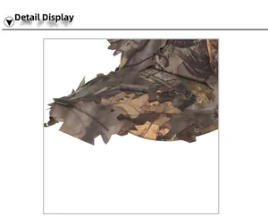 Close-up of 3D leaf camouflage fabric showing detailed realistic forest texture and patterns