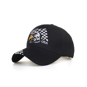 Detail of embroidered eagle, checkered pattern and USA logo on black baseball cap
