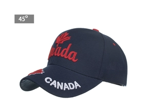 Detail of navy cotton baseball cap featuring red Canada maple leaf and embroidered brim