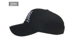Side view of black baseball cap featuring USA embroidery and checkered flag pattern