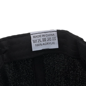 Contrast Canada flag embroidery baseball cap with black knit and care label details
