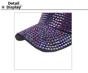 Close-up of sparkling purple rhinestones on a black fabric baseball cap brim