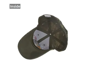 Inside view of camo baseball cap showing stitching, air holes, and acrylic fabric label