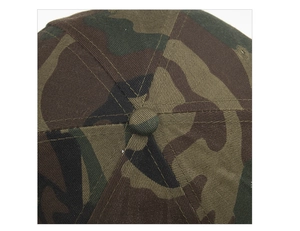Detailed close-up of woodland camouflage baseball cap with fine stitching and top button