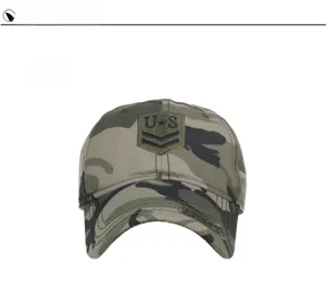 Detail of military camouflage baseball cap featuring an embroidered U.S. shield patch