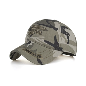 Detail of NAVY SEALS embroidery on camo baseball cap with high-quality stitching