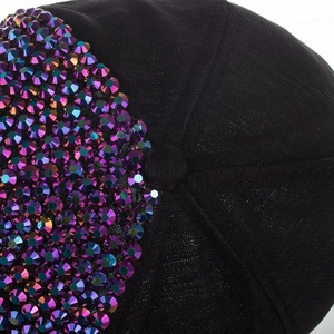 Classic black baseball cap with vibrant purple rhinestones and textured fabric design