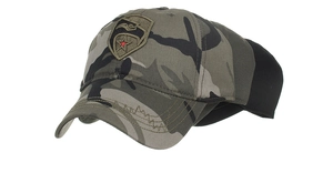 Close-up of camouflage tactical baseball cap featuring eagle and red star shield embroidery