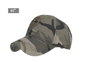 Detail view of camouflage baseball cap with embroidered star shield patch on front