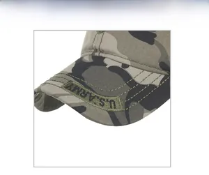 Detailed close-up of U.S. ARMY embroidery on a camouflage baseball cap brim