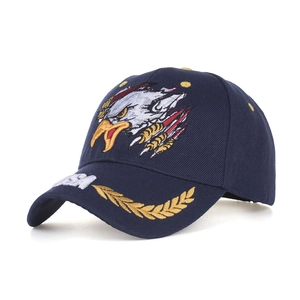 Detailed close-up of eagle embroidery and gold wheat ears on a navy USA baseball cap