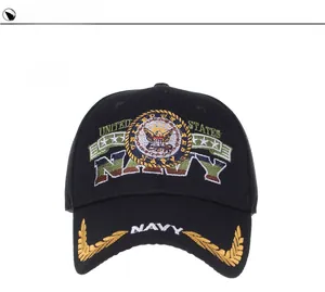 Detailed view of the United States Navy eagle embroidery on the black baseball cap brim