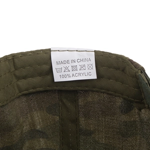 Internal details of camouflage baseball cap with 100% acrylic material tag