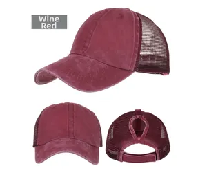 Three-angle view of a wine red washed mesh ponytail baseball cap with adjustable strap