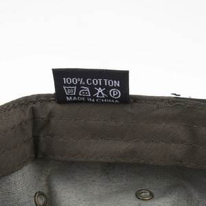 Internal view of brown cotton army cap showing sweatband and 100% cotton wash label