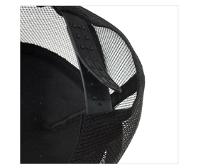 Detail of adjustable black mesh trucker hat with snapback plastic closure and breathable back