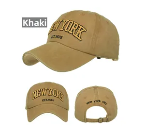 Detail view of khaki New York embroidered cotton baseball cap with adjustable metal buckle