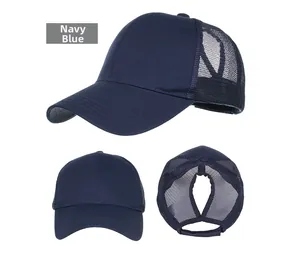 Detailed view of navy blue ponytail baseball cap featuring breathable mesh panels and high hole