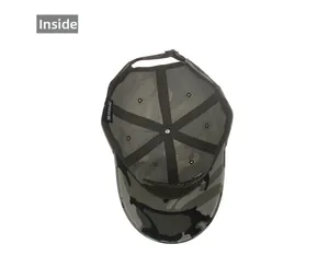 Inside view of camouflage baseball cap showing internal straps and metal eyelets