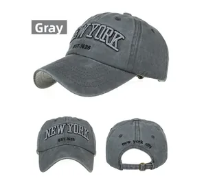 Detail view of washed grey cotton baseball cap with New York embroidery and metal buckle