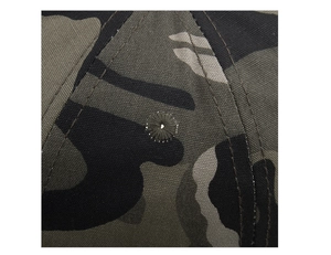 Close-up of jungle camouflage baseball cap with embroidered eyelet and durable stitching