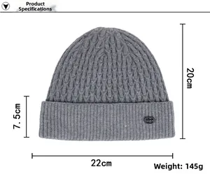 Detailed view of dark grey cable knit beanie with FASHION label and size measurements