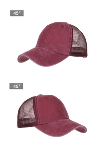 Detail view of the burgundy washed cotton and mesh ponytail baseball cap from 45 degree angles