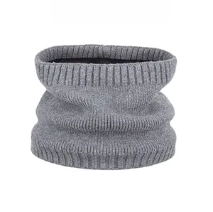 Detailed view of dark grey rib knit neck gaiter with premium wool blend texture