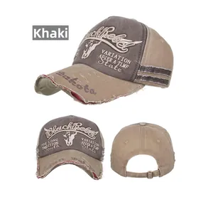 Detail of washed cotton baseball cap with vintage distressed edges and bull embroidery