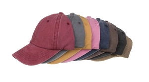 Detailed stack of multi-color washed cotton baseball caps with vintage distressed texture