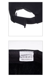 Detail view of black baseball cap with velcro strap and 100 percent acrylic wash label