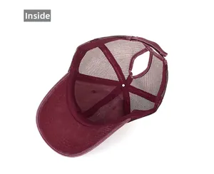 Interior view of burgundy ponytail baseball cap showing mesh structure and velcro strap