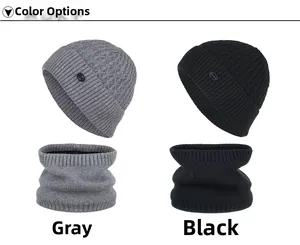 Detailed view of grey and black knitted hat and neck gaiter set with fleece lining