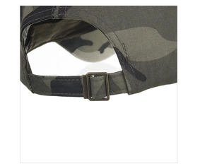 Macro view of camouflage baseball cap with adjustable bronze metal buckle at the back
