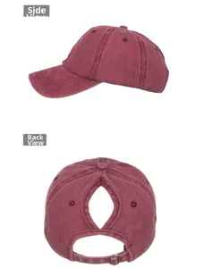Detail view of burgundy washed cotton ponytail baseball cap with vintage metal buckle