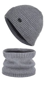 Detailed close-up of dark grey thermal knit hat and neck gaiter set with ribbed texture