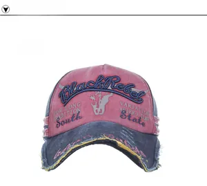 Front view of vintage washed cotton baseball cap with embroidered bull head letters