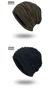 Close-up of thick knit winter beanies in khaki and navy with warm fleece lining