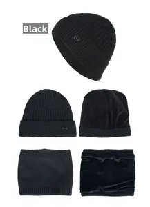 Detail view of the black knit beanie and neck warmer set with soft fleece lining and logo
